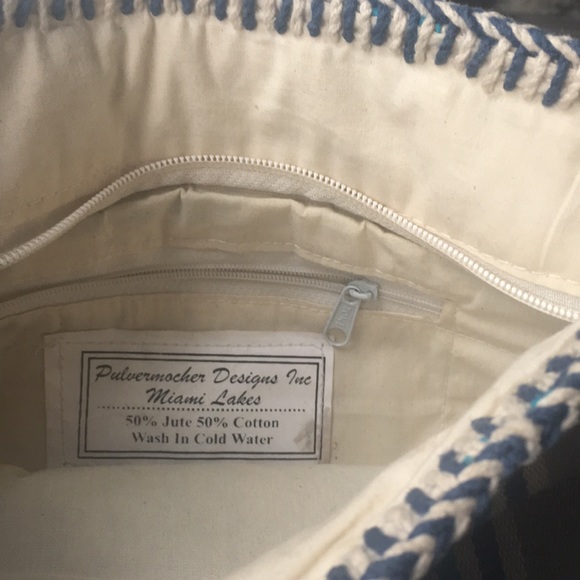 Striped clutch with leather detail - Picture 3 of 5